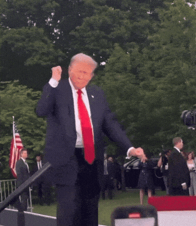 Man In Suit Dancing In Front Of Crowd GIF