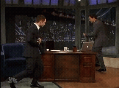 Man In Suit Dancing In Front Of Laptop GIF