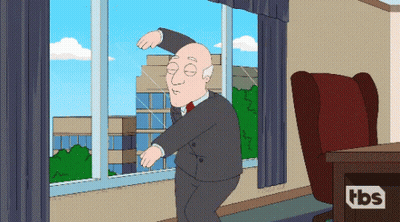 Man In Suit Dancing In Front Of TBS Logo Window GIF