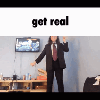 Man In Suit Dancing In Front Of TV Saying Get Real GIF