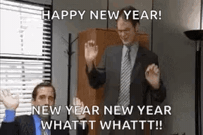 Man In Suit Dancing In Office While Another Man Looks On GIF