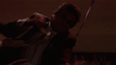 Man In Suit Dancing In Red Room GIF