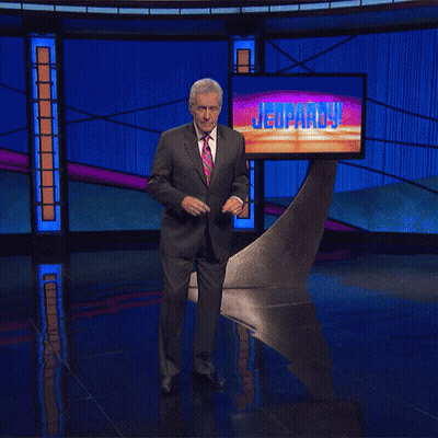 Man In Suit Dancing On Jeopardy Stage GIF