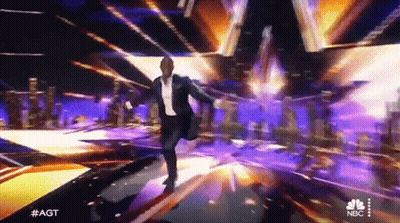 Man In Suit Dancing On NBC Stage GIF