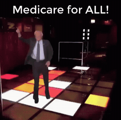Man In Suit Dancing Saying Medicare For All GIF