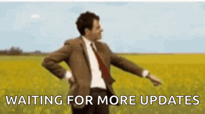 Man In Suit Dancing Waiting For More Updates GIF