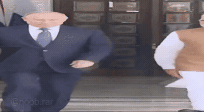 Man In Suit Dancing With Another Man GIF