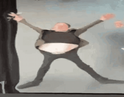 Man In Suit Dancing With Big Belly GIF