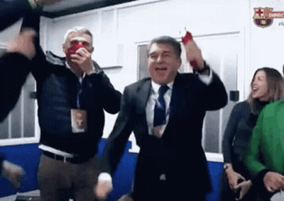 Man In Suit Dancing With Group GIF
