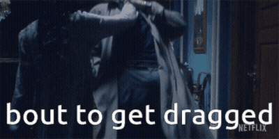 Man In Suit Dragged By Woman In Black Glove GIF