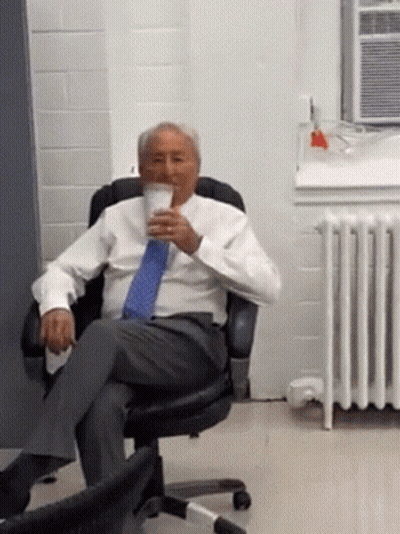 Man In Suit Drinking Coffee GIF
