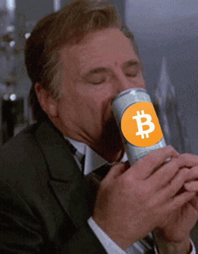 Man In Suit Drinking From Can With B Logo GIF