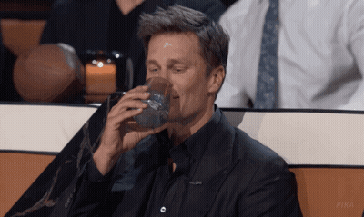 Man In Suit Drinking From Glass With Pika GIF