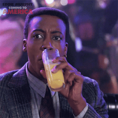 Man In Suit Drinking From NBA Mug GIF