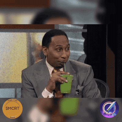 Man In Suit Drinking Green Cup Through Straw GIF