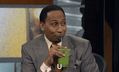 Man In Suit Drinking Green Smoothie GIF