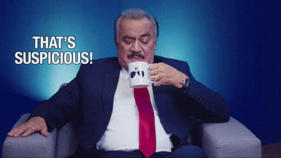Man In Suit Drinking Suspicious Mug GIF