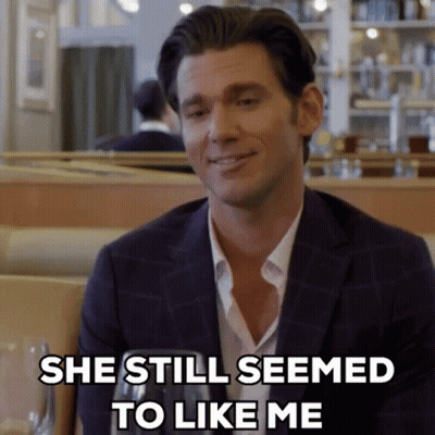 Man In Suit Drinking Wine GIF