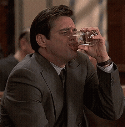 Man In Suit Drinking Wine GIF