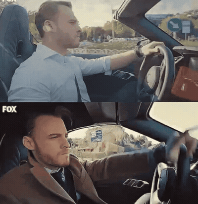 Man In Suit Driving Car Saying Fox GIF