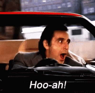 Man In Suit Driving Car Says Hoo-Ah GIF