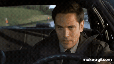 Man In Suit Driving Car With Make A GIF