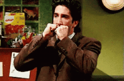 Man In Suit Eating Kellogg's Cereal GIF