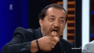 Man In Suit Eating On MasterChef Turkey Show GIF