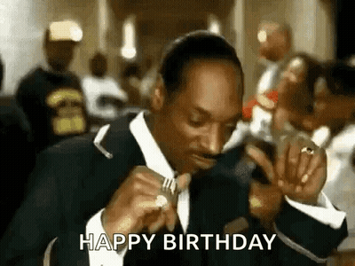 Man In Suit Eating With Fork Says Happy Birthday GIF