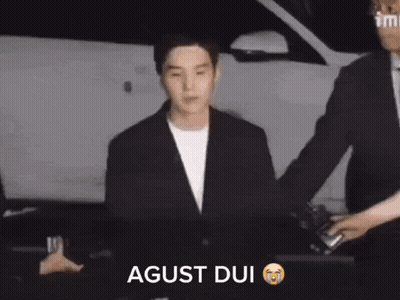 Man In Suit Escorted Saying Agust Dui GIF