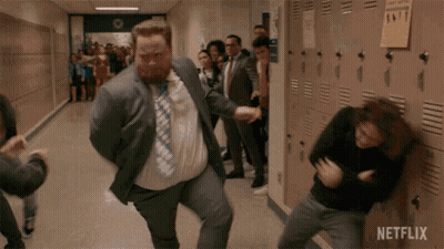Man In Suit Fighting Another Man In Hallway GIF