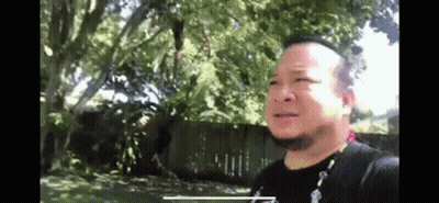 Man In Suit Fighting Another Man In Wrestling Match GIF