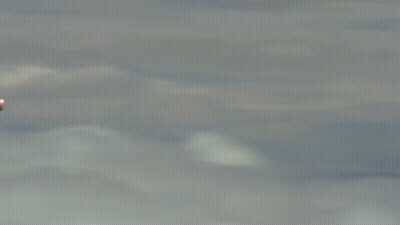 Man In Suit Flying With Chest Rocket GIF