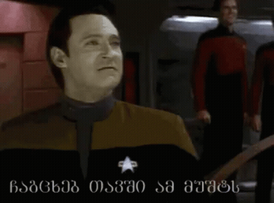 Man In Suit Funny Face Next To Another Man GIF