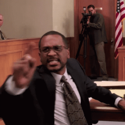 Man In Suit Giving Courtroom Speech GIF