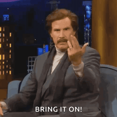 Man In Suit Giving Middle Finger Saying Bring It On GIF