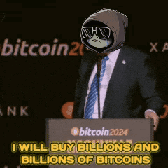 Man In Suit Giving Speech At Bitcoin Podium GIF