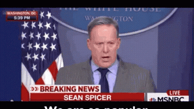 Man In Suit Giving Speech In Front Of White House Sign GIF