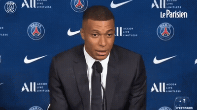 Man In Suit Giving Speech Le Football Il A Change GIF