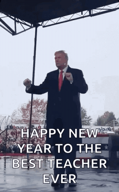Man In Suit Giving Speech On Stage GIF