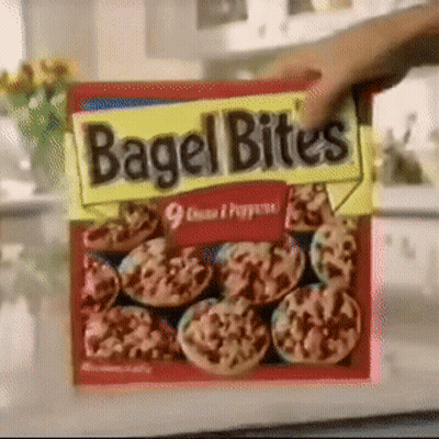 Man In Suit Giving Speech Says We Got Bagels Woo GIF