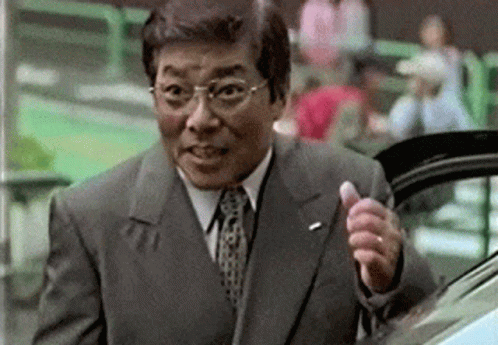 Man In Suit Giving Thumbs Up GIF