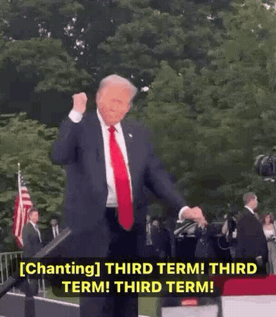 Man In Suit Giving Thumbs Up At Microphone GIF