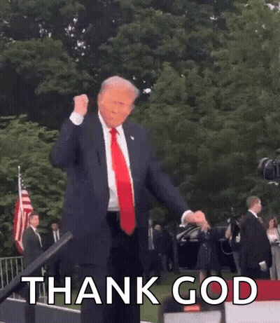 Man In Suit Giving Thumbs Up Saying Thank God GIF