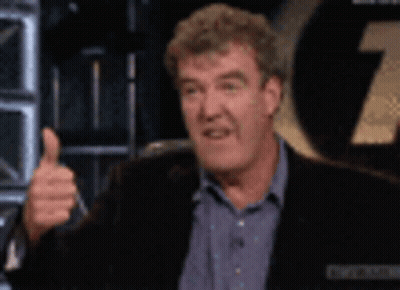 Man In Suit Giving Thumbs Up GIF