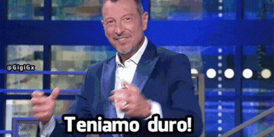 Man In Suit Giving Thumbs Up Teniamo Duro GIF