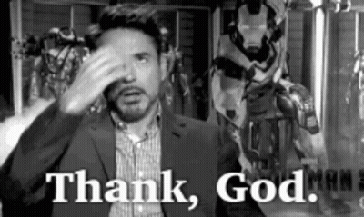Man In Suit Hand To Face Thank God GIF