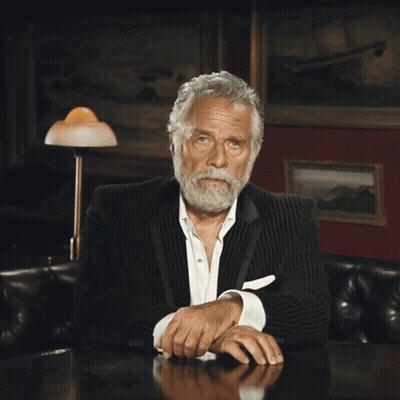 Man In Suit Hand To Face GIF