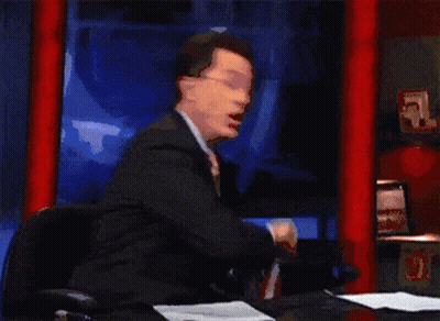 Man In Suit Holding American Flag Saying USA GIF