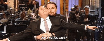 Man In Suit Holding Another Man Saying Am I Flying Jack GIF